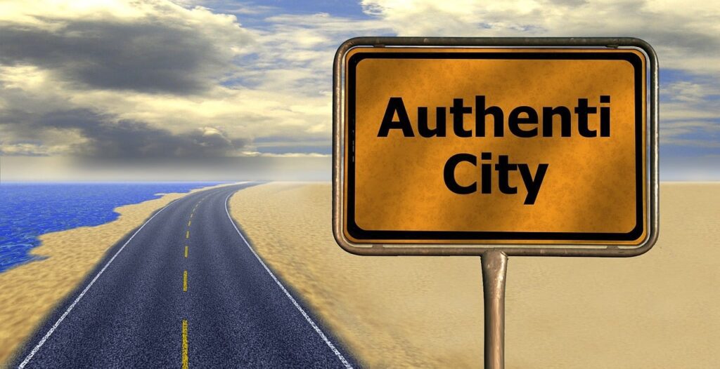 Pancarte sur une route et c'est inscrit Authenticity, connexion authentique marketing